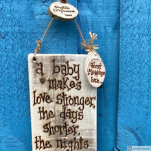 Load image into Gallery viewer, PERSONALISED BABY PEBBLE ART PLAQUE/ &quot;A BABY MAKES LOVE STRONGER....&quot;
